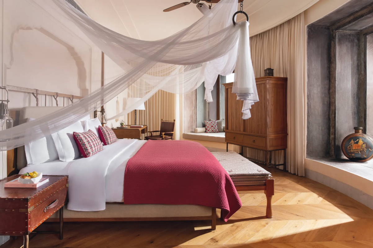 View of the bedroom in the Rani Rajkumari Suite at Six Senses Fort Barwara, a hotel in India. Source: IHG.